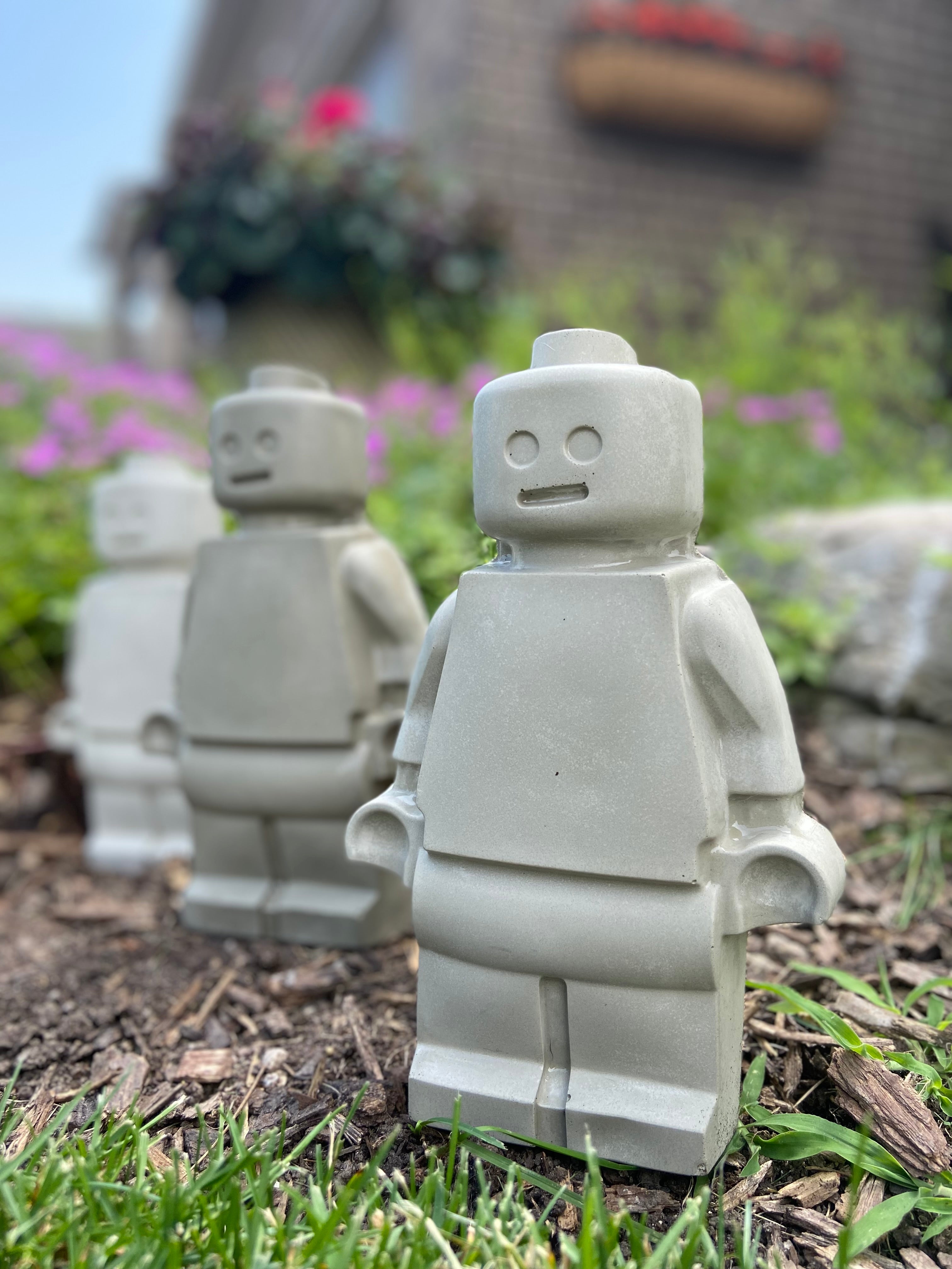 Concrete lego man sale